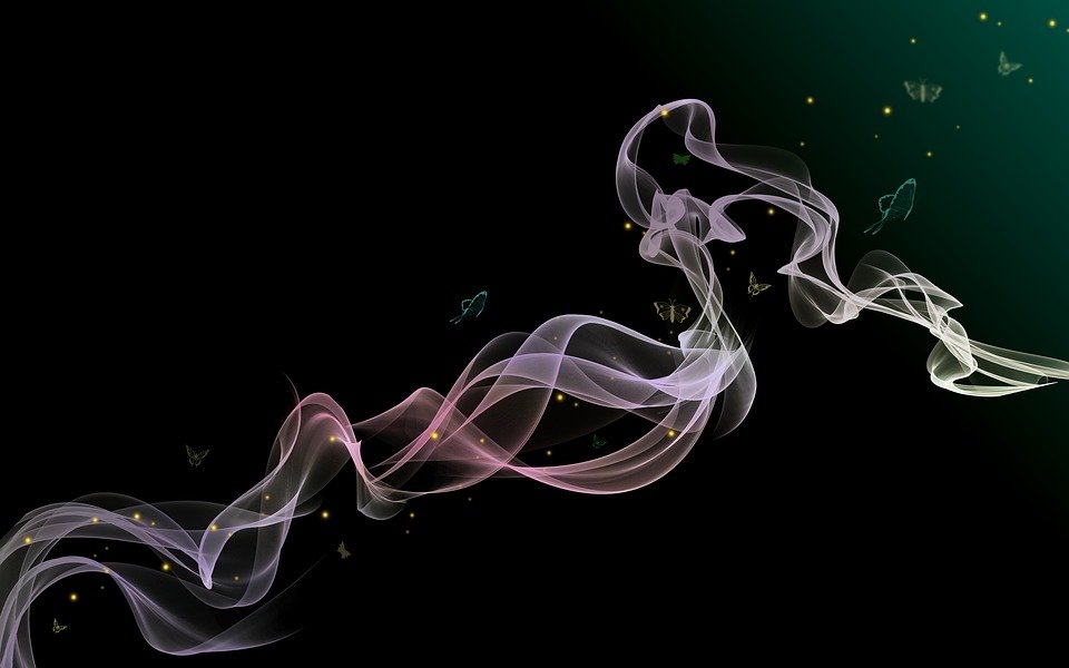 Swirling Smoke with butterflies fluttering about on a black back ground. The smoke represents evanescing into thin air.