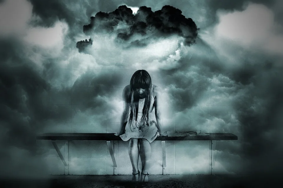 dark clouds over sad girl sitting bench